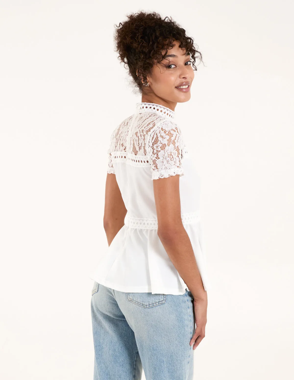 Lace Trimmed Peplum Top